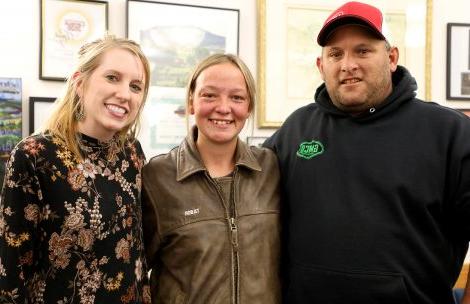 Garfield County Fair Board Member Duston Harris, scholarship recipient Tabor Tiffany, and Kati Ledall of the Two Rivers Community Foundation.